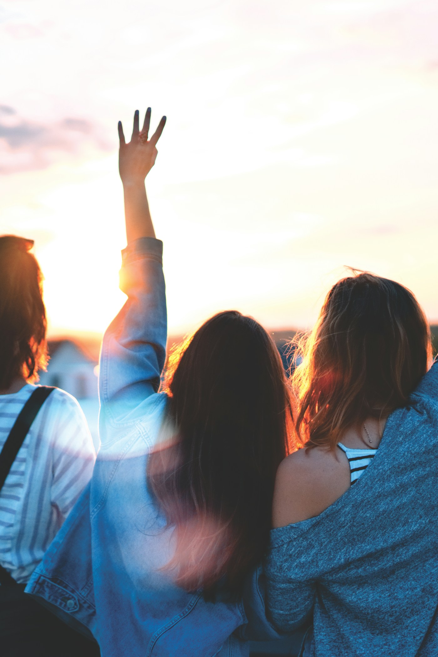 Friends smiling and connecting outdoors